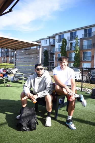 Two players sitting courtside at PATL Louisville