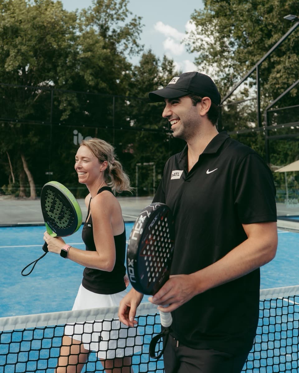 PATL players smiling together on court