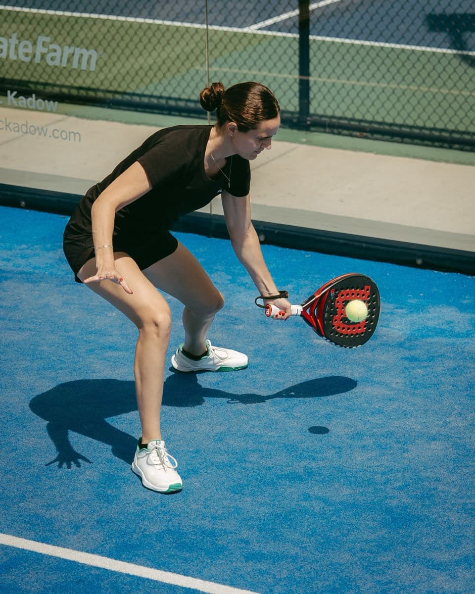 Player hitting a low volley at a PATL event